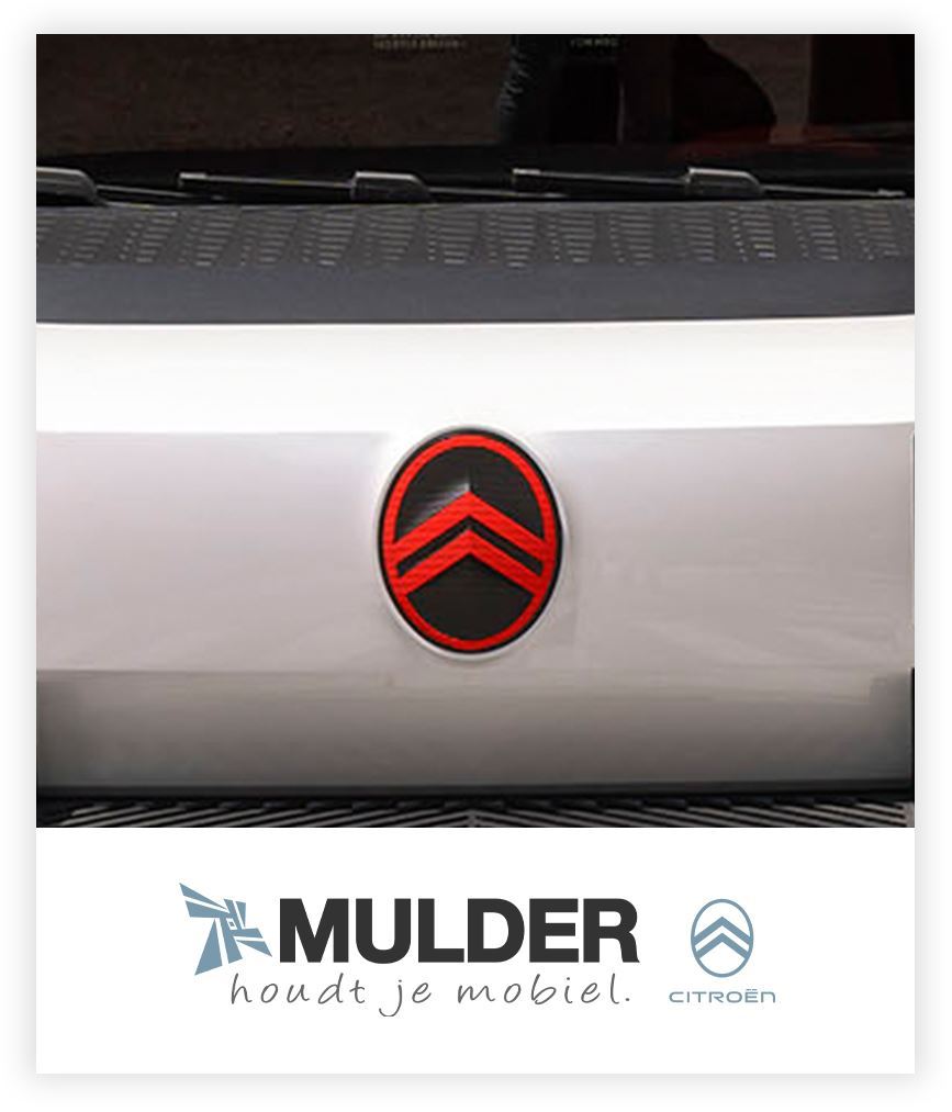 Witte Citroën grille met Mulder logo er onder